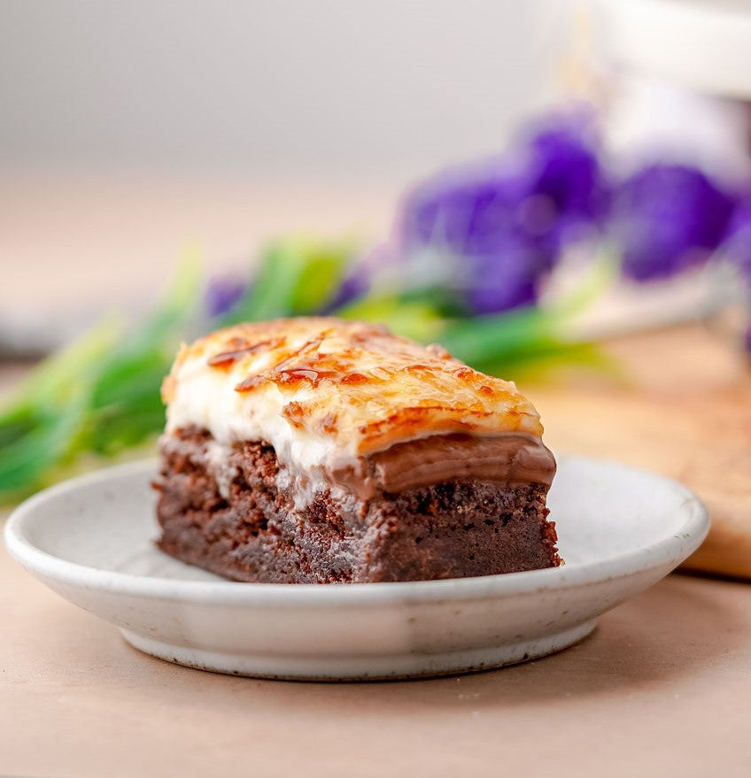 Grain-free Crème Brûlée brownie slice sitting on a plate