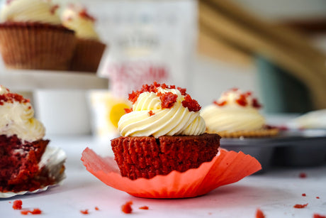 Cassava Flour Red Velvet Cupcake with cream cheese icing and cake crumbs