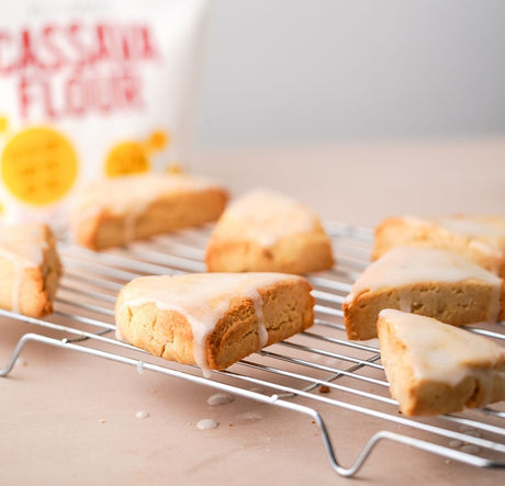 Grain-Free Vanilla Bean scones with icing. Otto's Naturals cassava flour bag in background