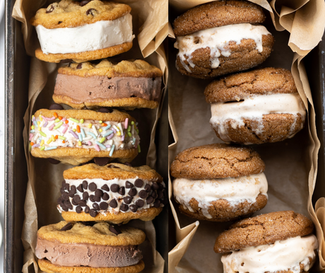 left side: chocolate chip cookie ice cream sandwiches, with vanilla and chocolate ice cream and rolled in sprinkles and chocolate chips. right side: molasses cookie ice cream sandwiches